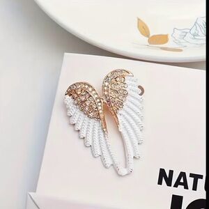 Elegant Gold and White Angel Wing Brooch